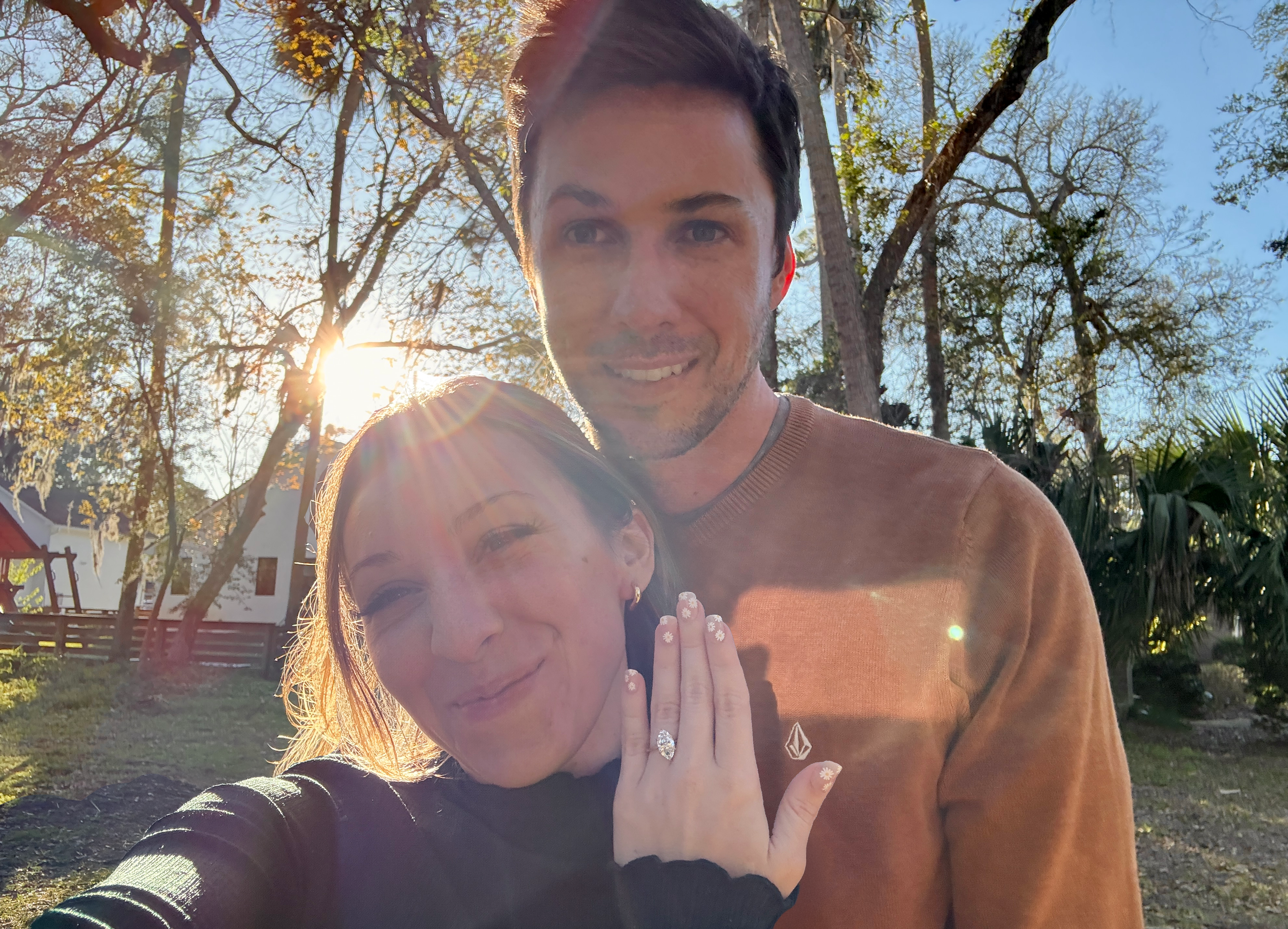Ashley Aucoin and Laine Golay walking hand in hand through St. Augustine’s historic streets