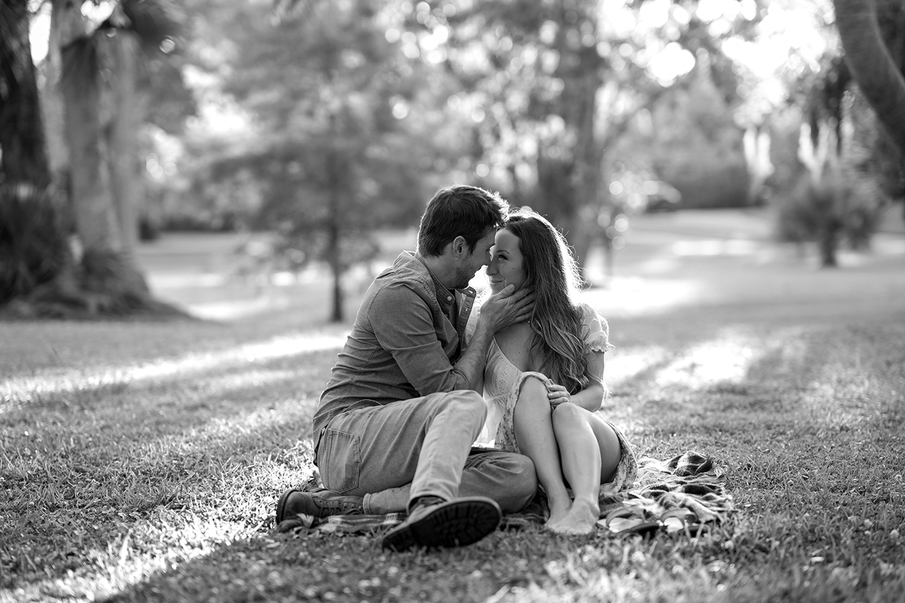 Black and white style portrait of Ashley Aucoin and Laine Golay during engagement photos